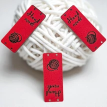 Piros-fekete hand-made bőr címke